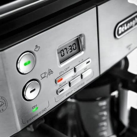 Taghareed De'Longhi BCO431.S silver and black combination coffee machine with digital display and control buttons.
