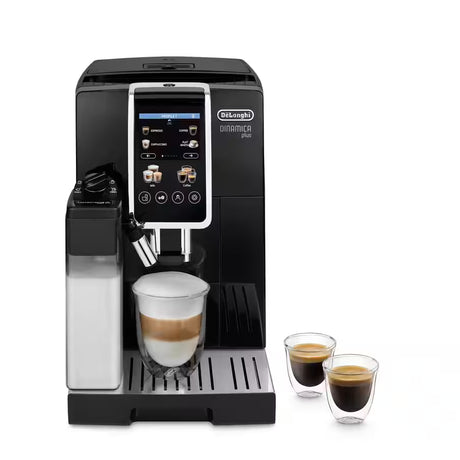 Taghareed De'Longhi Dinamica Plus fully automatic coffee machine with LatteCrema system, making a layered latte in a glass.