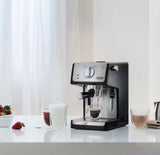 Taghareed De'Longhi ECP 35.31 espresso machine with stainless steel accents, brewing espresso into a glass.