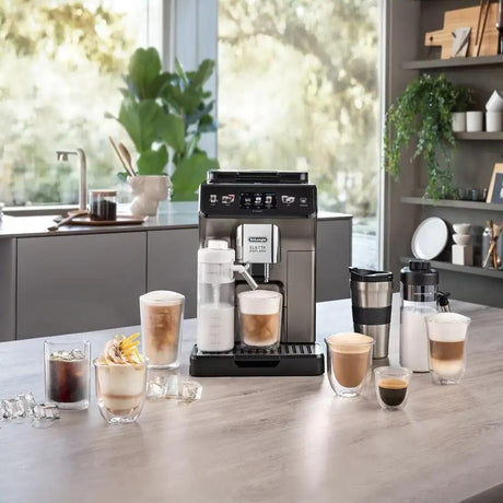 Taghareed De'Longhi Eletta Explore automatic coffee machine with multiple coffee drinks and travel mugs.