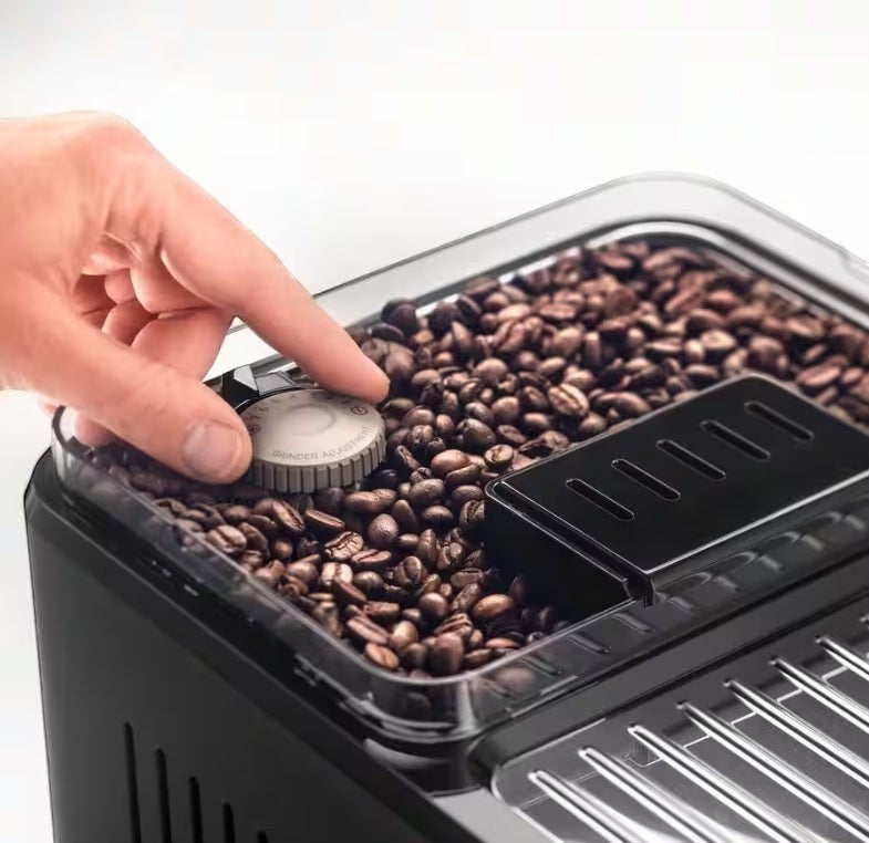 Taghareed De’Longhi Eletta Explore coffee machine with grinder adjustment dial and coffee beans
