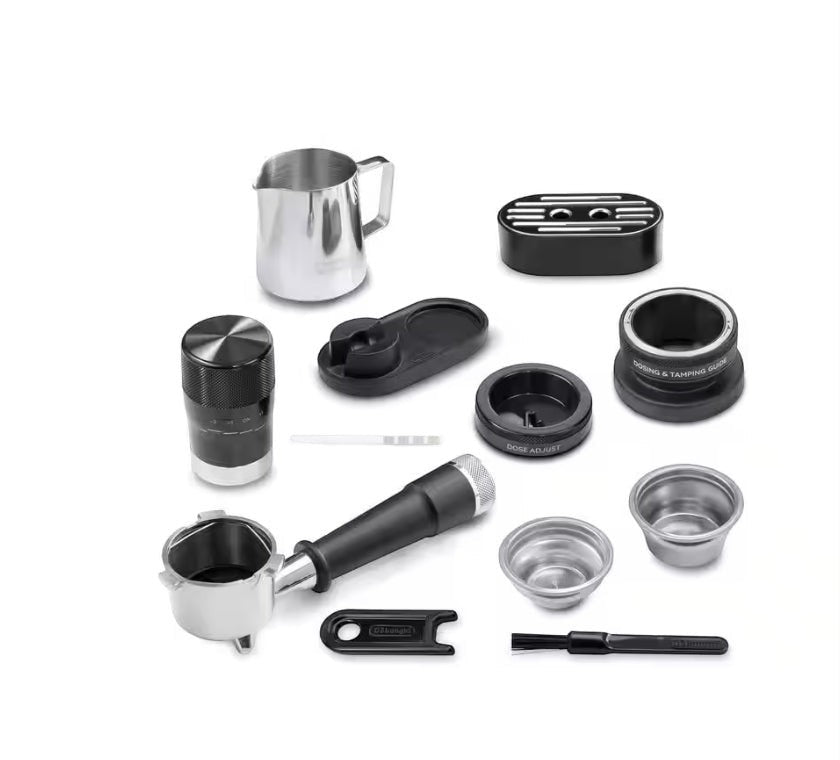 Taghareed De'Longhi La Specialista Touch EC9455.M barista kit with stainless steel milk pitcher, portafilter, tamper, and cleaning tools.