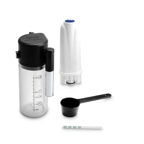 Taghareed De'Longhi Magnifica Evo coffee machine accessories: milk carafe, water filter, scoop, and test strips.