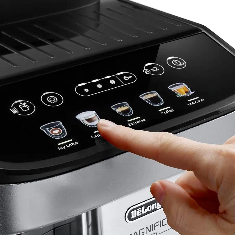 Taghareed De'Longhi Magnifica Evo automatic coffee machine with touch screen interface, finger pressing cappuccino button.