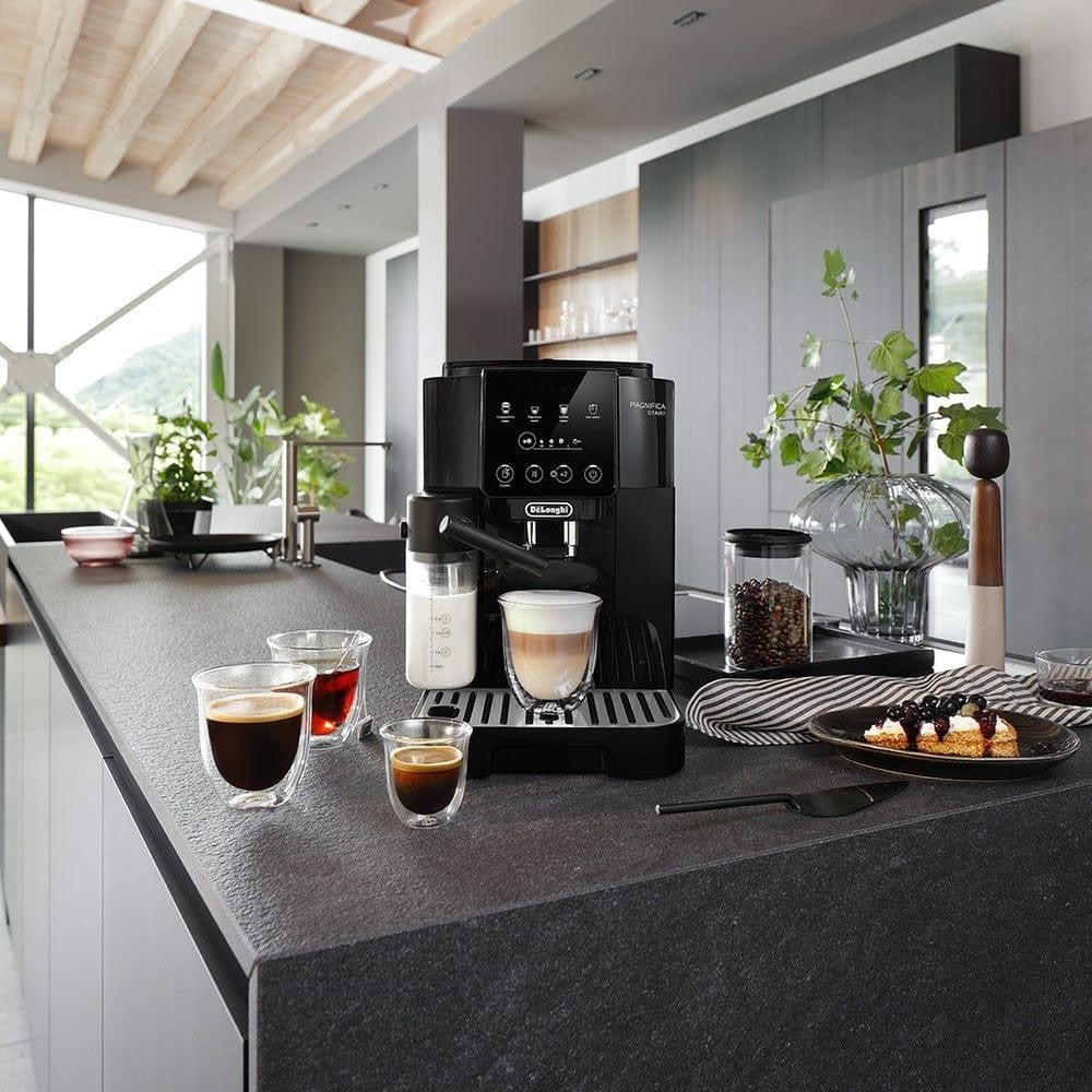 Taghareed De'Longhi Magnifica Start automatic coffee machine with LatteCrema Hot system, black, making a cappuccino.