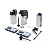 Taghareed De’Longhi PrimaDonna Elite coffee machine accessories including milk carafes, cleaning brushes, and measuring scoop.