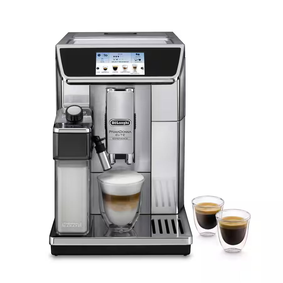 Taghareed De’Longhi PrimaDonna Elite Experience fully automatic coffee machine in stainless steel with a touchscreen and milk carafe, brewing a latte.