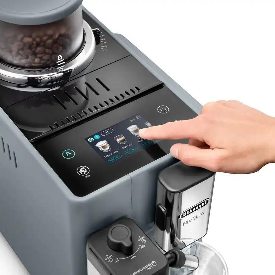 Taghareed De'Longhi Rivelia automatic coffee machine with touchscreen, dual bean hoppers, and LatteCrema Hot system.
