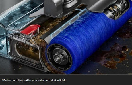 Taghareed Dyson V12s Detect Slim Submarine vacuum cleaner head with blue brush roll washing hard floors.