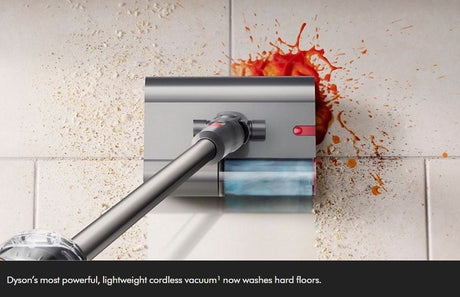 Taghareed Dyson V12s Detect Slim Submarine cordless vacuum washing a soiled floor with liquid and debris.