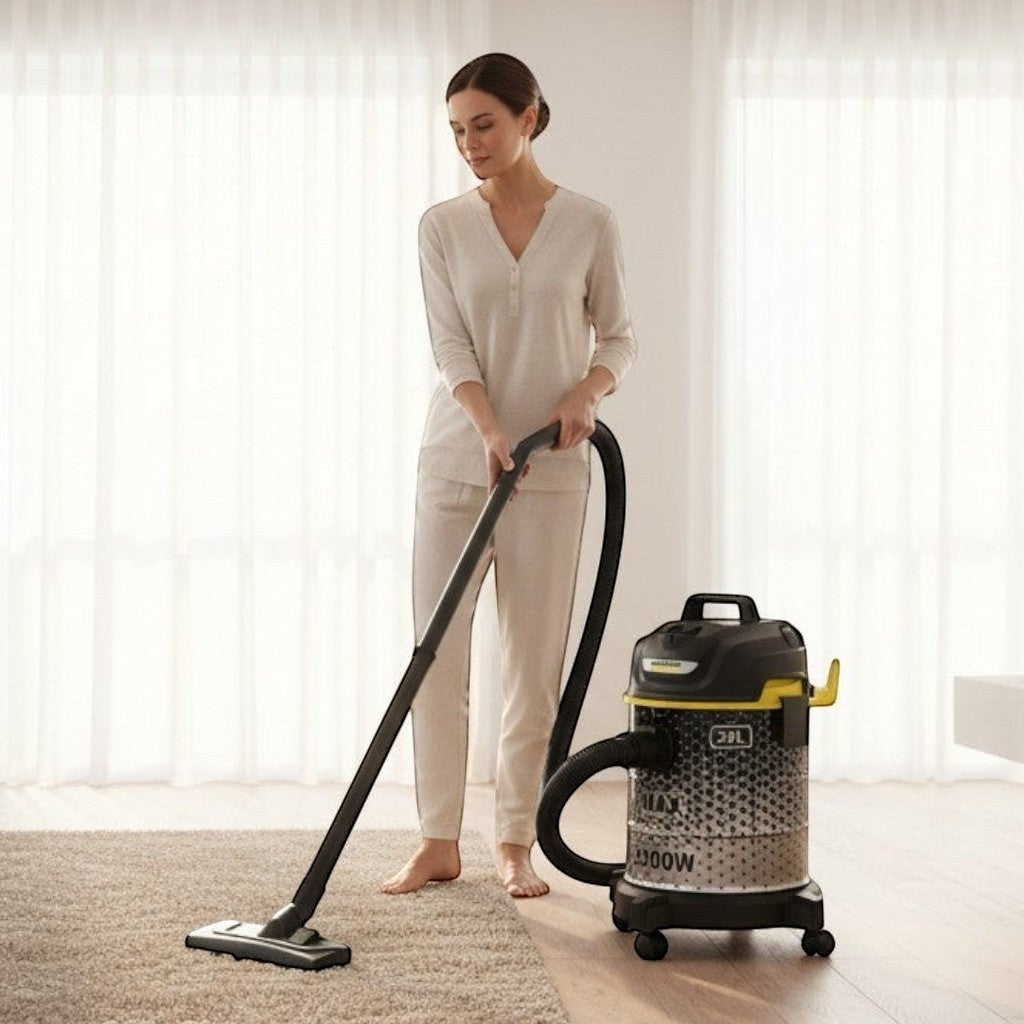Taghareed Kärcher DVAC 2200 bagless vacuum cleaner with 22L capacity and blower function, used by a woman on a rug.