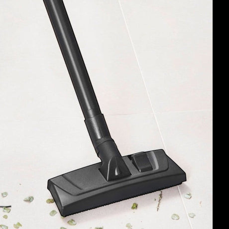 Taghareed Kärcher DVAC 2200 bagless vacuum cleaner with 22L capacity and blower function on tiled floor.