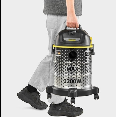 Taghareed Kärcher DVAC 2200 bagless vacuum cleaner with 22L capacity and blower function, silver and black barrel design.