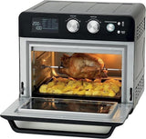 Taghareed Kenwood 25L digital air fryer oven with rotisserie chicken and roasted potatoes inside.