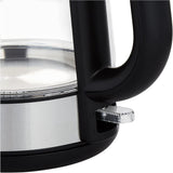Taghareed Kenwood 1.7L glass kettle with black handle and stainless steel base. Features cordless design and rapid boil.