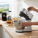 Taghareed silver Kenwood Prospero+ stand mixer with K-beater, preparing chocolate chip cookies.