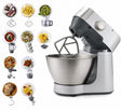 Taghareed Kenwood Prospero+ stand mixer in silver with stainless steel bowl and attachments for blending, chopping, juicing, and grinding.