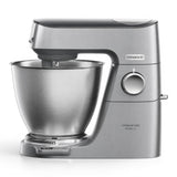 Taghareed Kenwood Titanium Chef Baker XL stand mixer in silver, with a 7L stainless steel bowl and planetary mixing system.