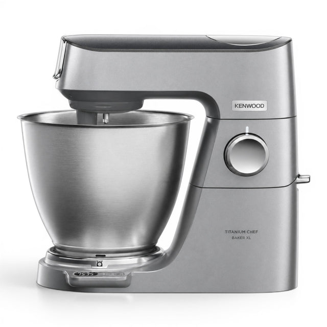 Taghareed Kenwood Titanium Chef Baker XL stand mixer in silver, with a 7L stainless steel bowl and planetary mixing system.