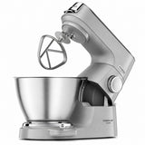 Taghareed Kenwood Titanium Chef Baker XL stand mixer in silver, with a 7L stainless steel bowl and K-beater attachment.