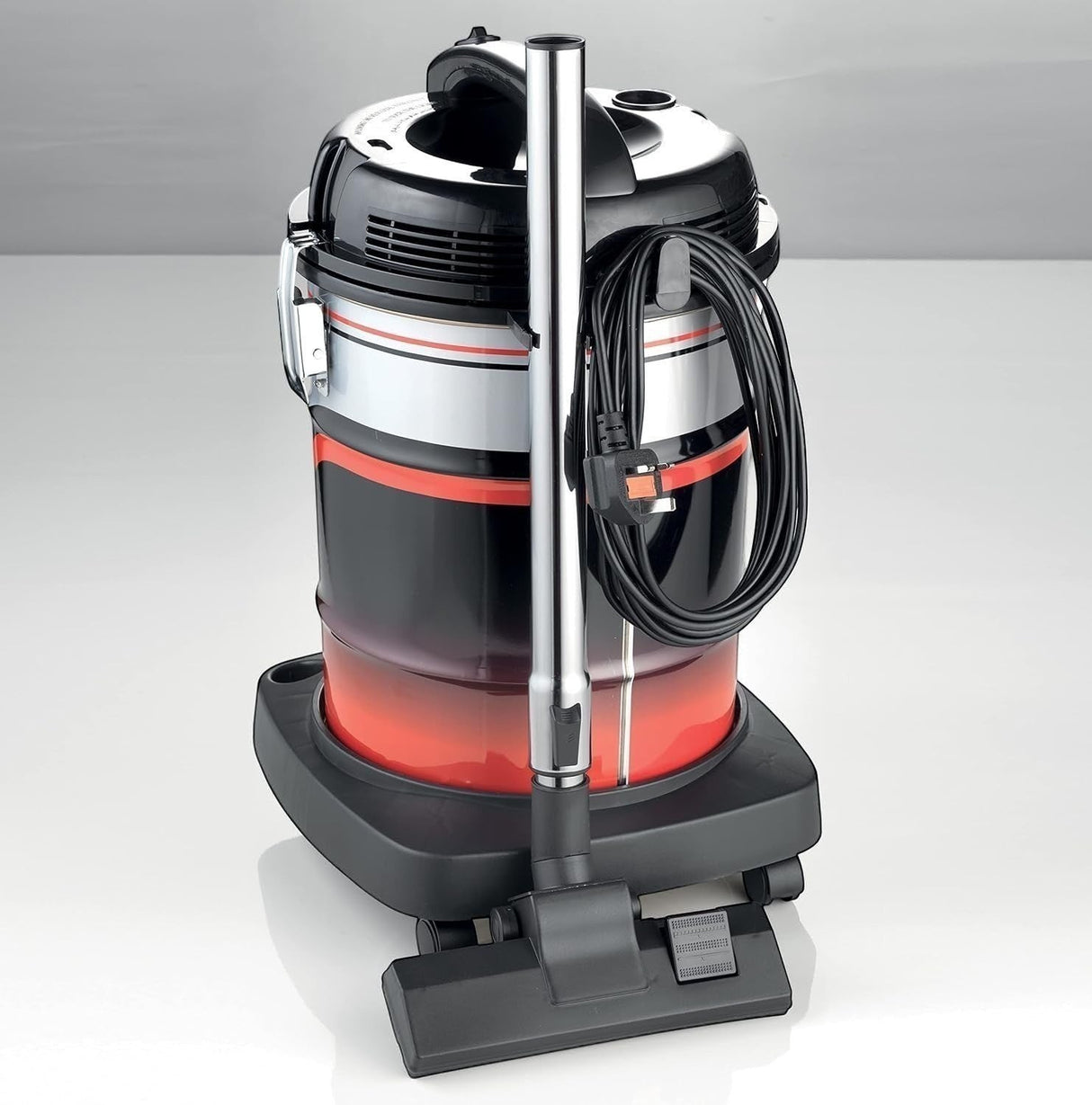 Taghareed Kenwood 2200W 25L Wet & Dry drum vacuum cleaner with floor brush attachment. Black, red, and silver.