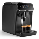 Taghareed Philips 2200 Series fully automatic espresso machine in black, with touch display and two cups of espresso.