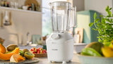 Taghareed Philips 3000 Series white blender with 1.9L capacity, ProBlend technology, and stainless steel blades. Includes mill attachment.