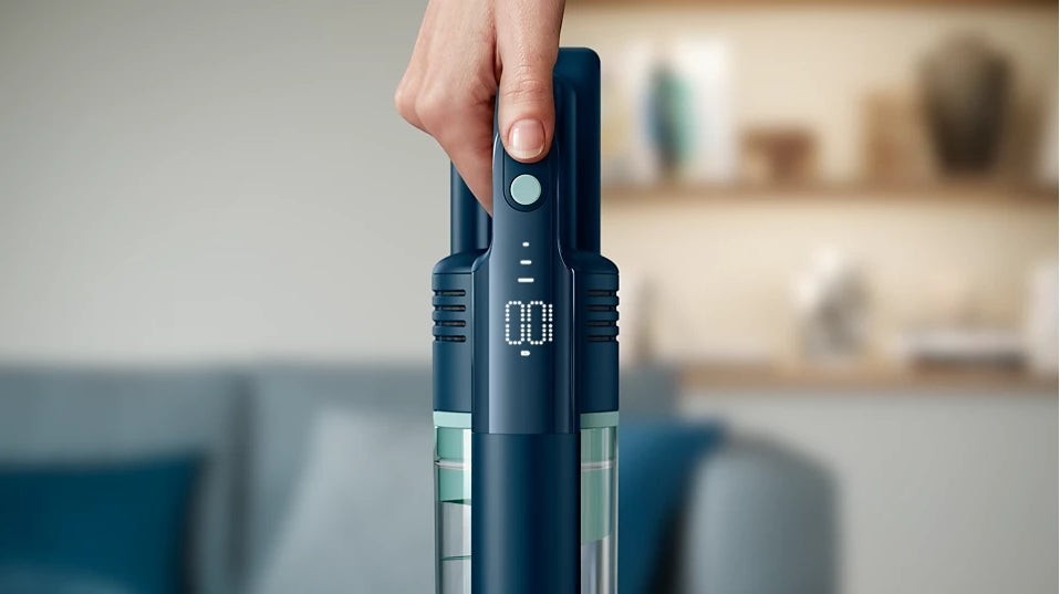 Taghareed Philips 5000 Series Cordless Vacuum Aqua XC5041/61, dark blue with aqua accents, digital display showing 100% battery.