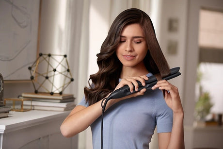 Taghareed Philips 5000 Series BHS510 hair straightener with argan-oil infused plates and Ionic Care for smooth styling.