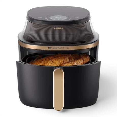 Taghareed Philips Airfryer 3000 Series XL NA342/09 with a whole chicken inside, featuring a digital display and RapidAir Plus technology.
