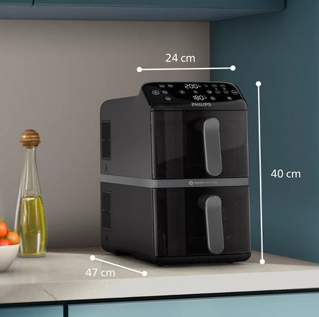 Taghareed Philips Airfryer 4000 Series stacked dual basket, black, 10L capacity, with transparent cooking windows.