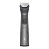 Taghareed Philips All-in-One Trimmer 7000 Series MG7922/15, grey, with 13 attachments for beard, hair, and body. Features BeardSense tech, steel blades, and Wet & Dry use.