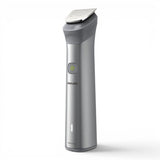 Taghareed Philips All-in-One Trimmer Series 5000 MG5923/15, silver metal body, 12 attachments for beard, hair, body, and nose/ear trimming.