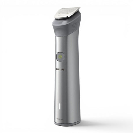 Taghareed Philips All-in-One Trimmer Series 5000 MG5923/15, silver metal body, 12 attachments for beard, hair, body, and nose/ear trimming.