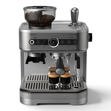 Taghareed Philips Barista Brew semi-automatic espresso machine with built-in grinder and stainless steel filter, making two espressos.