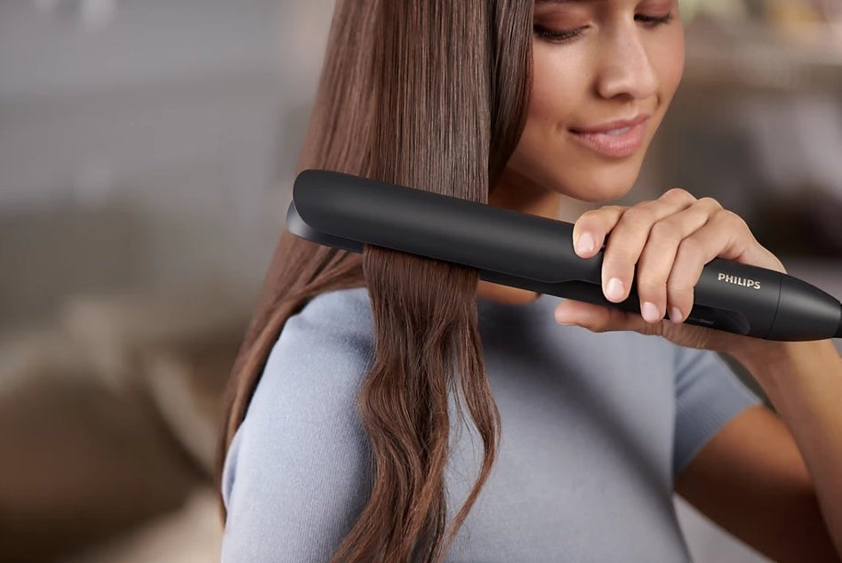 Taghareed Philips 5000 Series BHS510 black hair straightener with argan-oil infused plates and Ionic Care