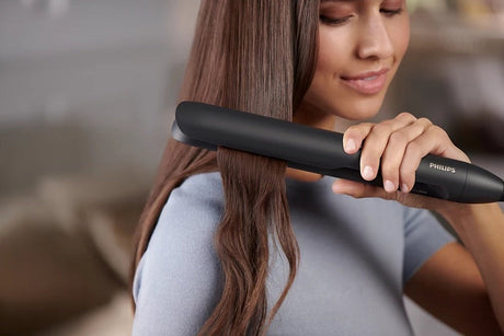 Taghareed Philips 5000 Series BHS510 black hair straightener with argan-oil infused plates and Ionic Care