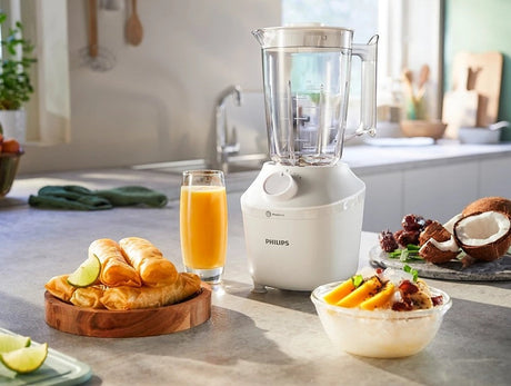 Taghareed Philips 3000 Series white blender with 1.9L jar, ProBlend technology, and 450W motor. Includes mill attachment.