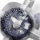 Taghareed Philips 5000 Series blender blades crushing ice cubes and small ice shards for a smoothie.