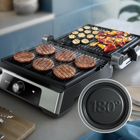 Taghareed Philips 5000 Series contact grill with burgers and vegetables cooking. Features 180° opening.