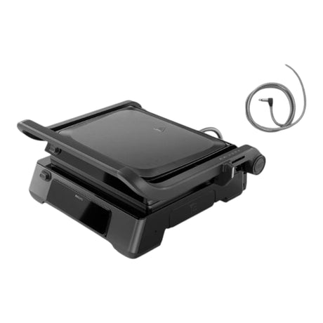 Taghareed Philips 7000 Series contact grill with temperature probe, 2200W, digital controls, 8 programs, 180° opening, non-stick plates.