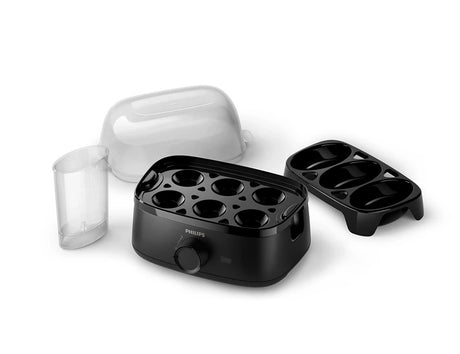 Taghareed Philips 3000 Series HD9137/91 black egg cooker with clear lid, steams up to 6 eggs or 3 poached eggs.