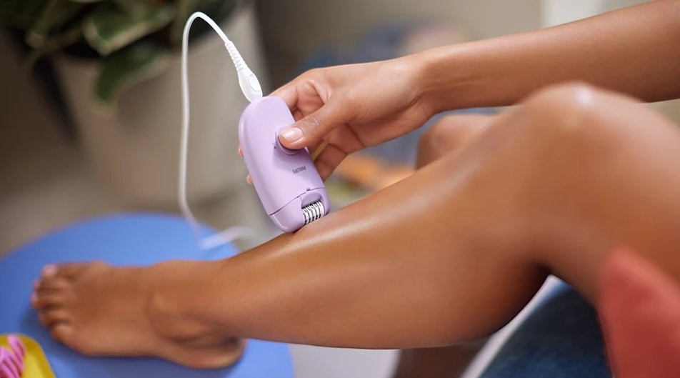 Taghareed Philips Epilator Series 4000 BRE257/00, lavender, corded, with Opti-Light for precise hair removal.