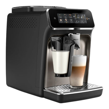 Taghareed Philips 3300 Series black automatic espresso machine with LatteGo system, making a latte.