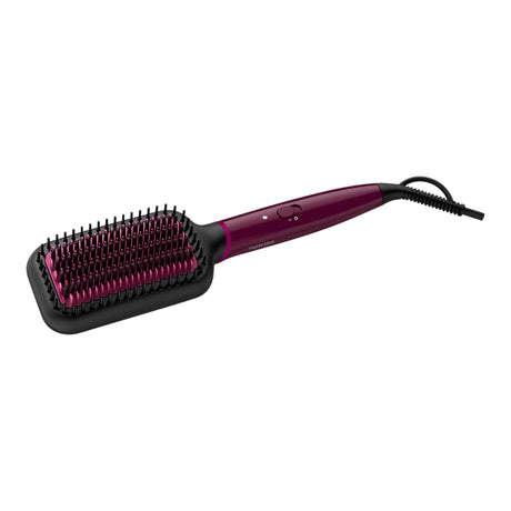 Taghareed Philips 5000 Series heated straightening brush with purple handle and black bristles, featuring ThermoProtect technology and keratin-infused ceramic coating.