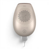 Taghareed Philips Lumea Advanced IPL 7000 Series BRI923/60 hair removal device in gold with 5 intensity levels and power button.