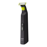 Taghareed Philips OneBlade Pro QP6530/23 electric trimmer with black body and yellow accents, features LED battery indicator.