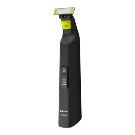 Taghareed Philips OneBlade Pro QP6530/23 electric trimmer with black body and yellow accents, features LED battery indicator.
