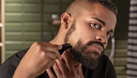 Taghareed Philips OneBlade Pro QP6530/23 trimmer with 12 length settings for beard grooming, trimming, edging, and shaving.