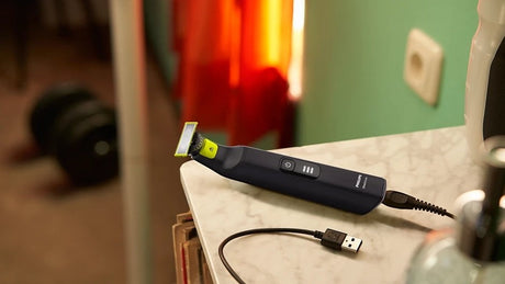 Taghareed Philips OneBlade Pro QP6542/10 electric trimmer with USB charging cable, black and yellow